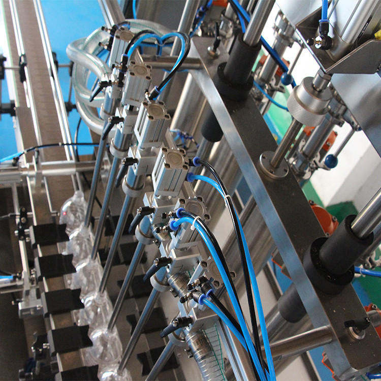 machine de remplissage d'huile